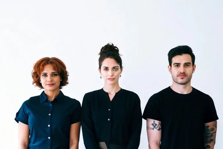 A diverse team of mental health professionals, including therapists, counselors, and social workers, looking approachable and empathetic