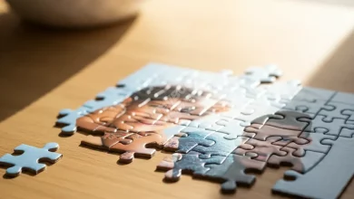 A jigsaw puzzle with pieces representing different aspects of empathy, partially assembled