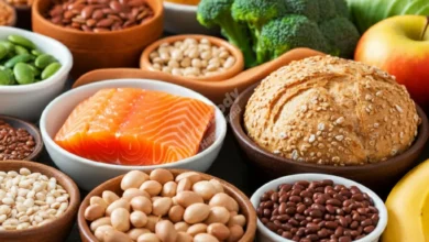 A colorful array of healthy carbohydrate sources like whole grains, fruits, and vegetables