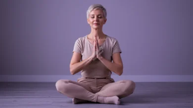 Serene meditator experiencing mindfulness meditation stress relief, surrounded by calming glow
